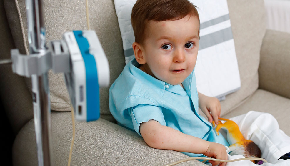 young patient sitting in hospital chair